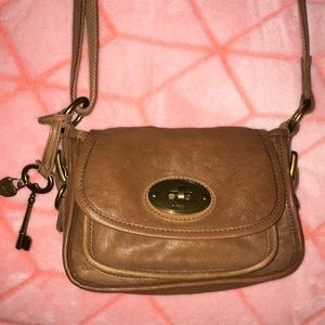 Fossil Purse with adjustable strap.